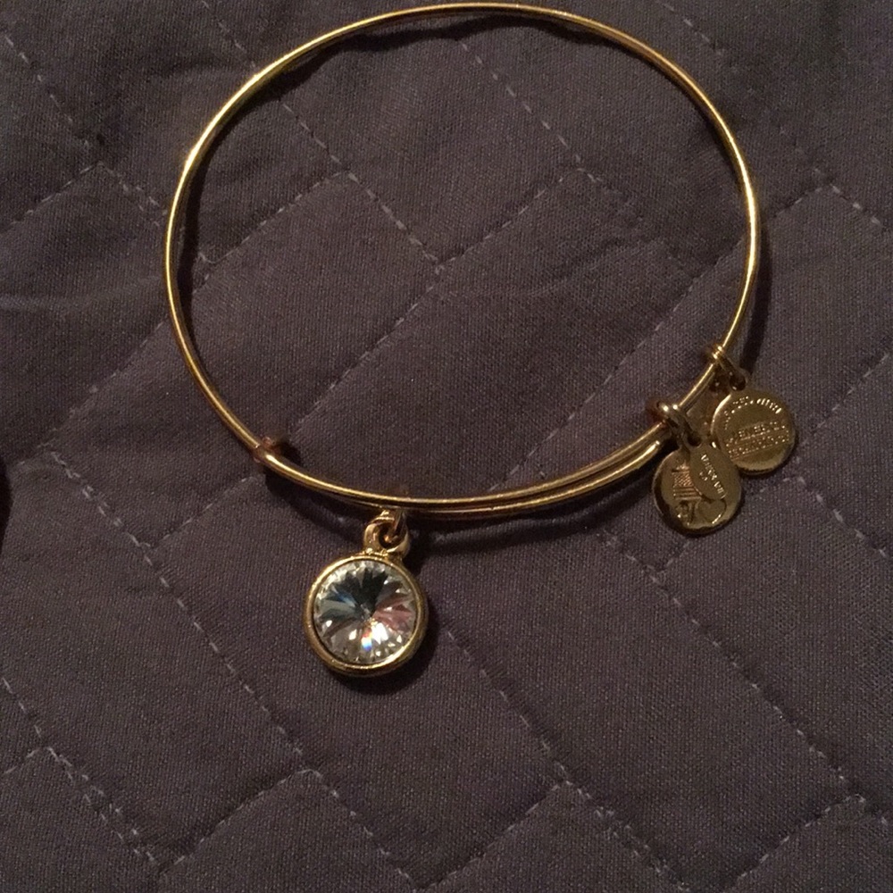 Alex and Ani gold bracelet with clear gemstone